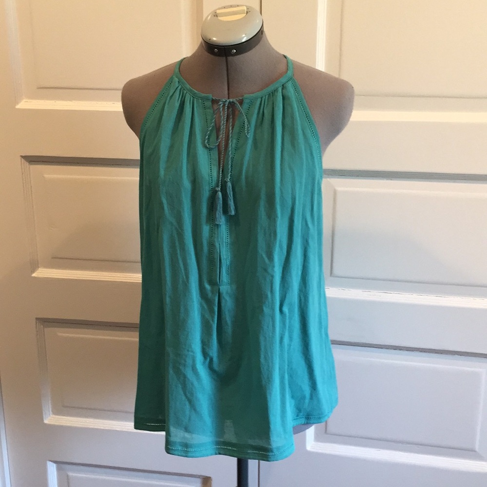 Sleeveless eyelet tassel tie top